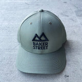 Baker Street Classic Logo Solid Twill Trucker Hat